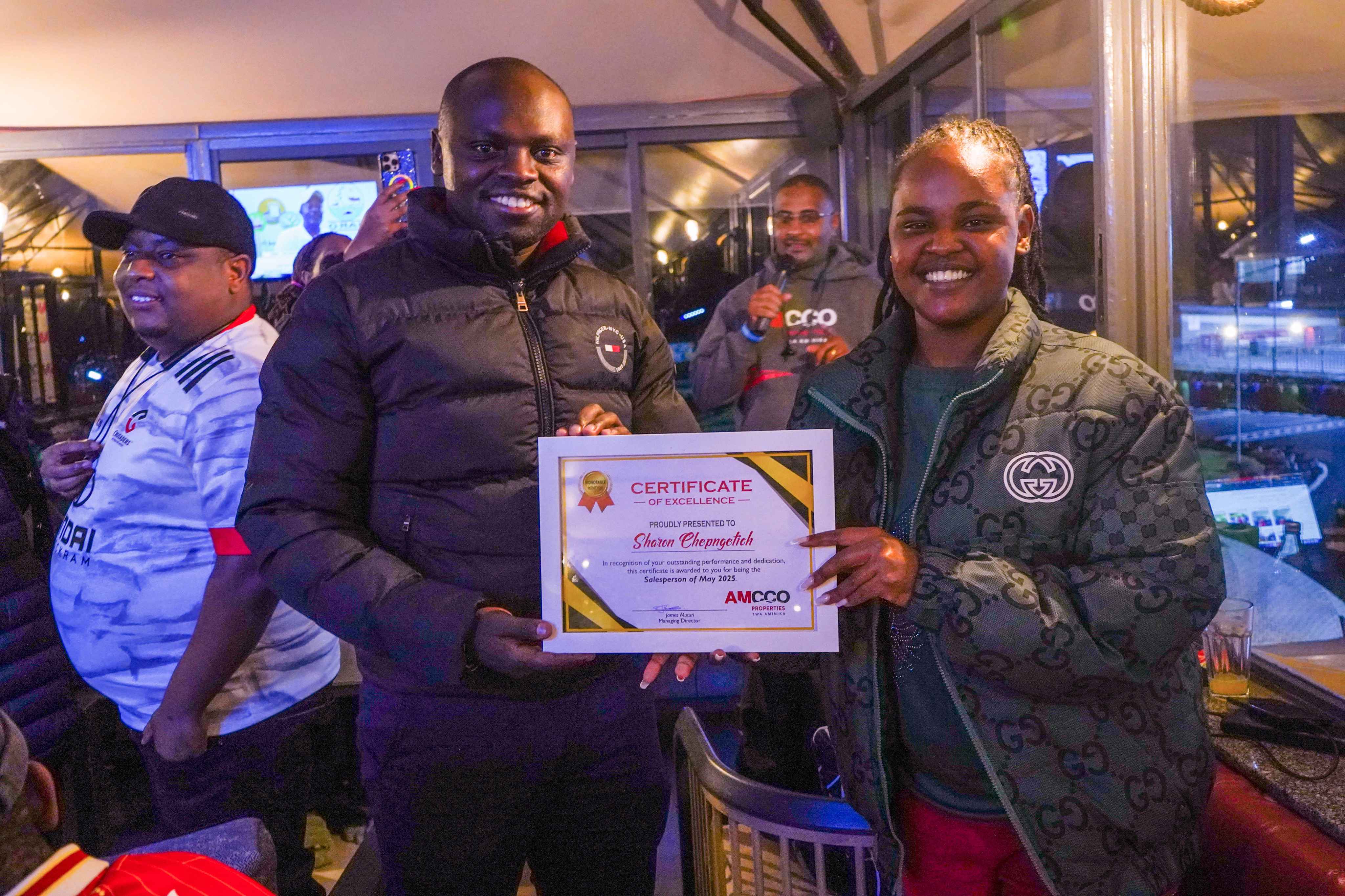 Sharon being awarded as Sales person of the month of May 2025