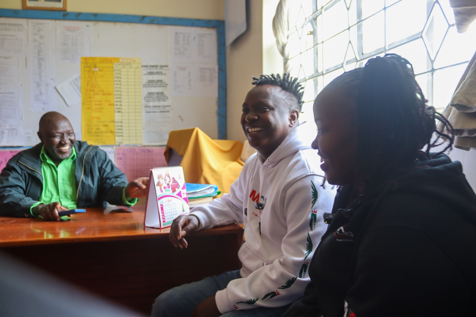 Mbote meeting his teacher after a long time